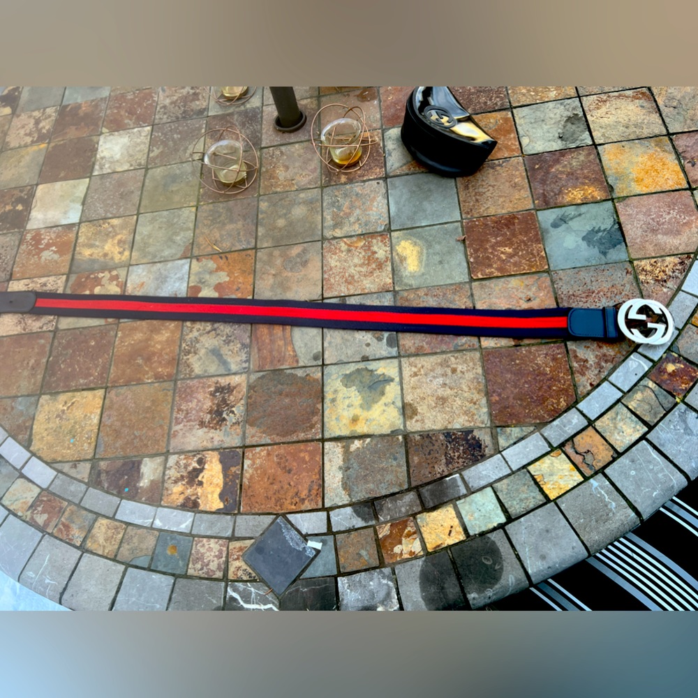 Used men’s Gucci belt. Fair condition. Blue/Red. Size 34+